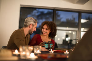 Woman being given a gift