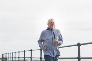 Senior man jogging outdoors
