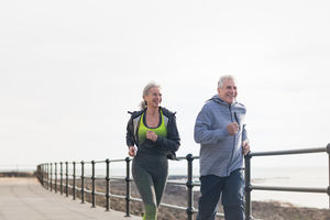 Senior couple jogging together