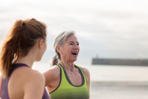 Active senior woman outdoors exercising