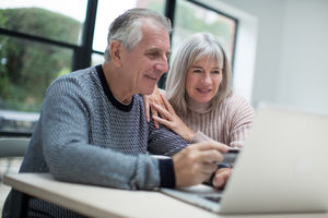 Senior couple online shopping