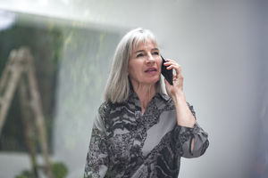 Senior businesswoman on smartphone
