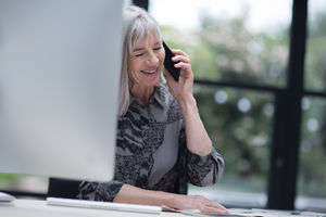Senior businesswoman working in office