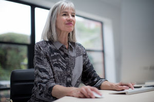 Senior businesswoman using computer
