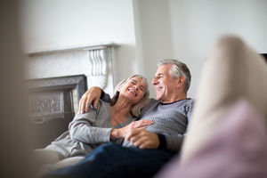 Senior couple relaxing on sofa