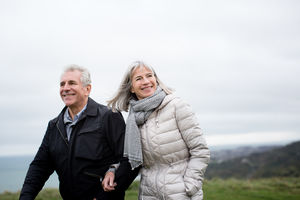 Senior couple walking outdoors