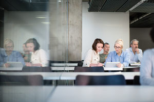 Female mature students working together on a course