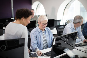 Senior woman on computing course