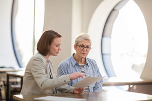 Senior woman with personal finance advisor