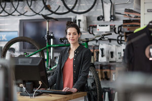 Portrait of small business owner in a bike store