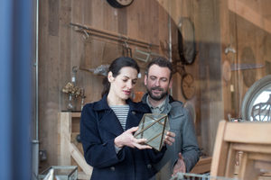 Couple looking shopping in vintage antique store