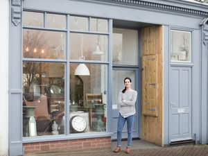 Portrait of small business owner outside store