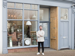 Portrait of small business owner outside store