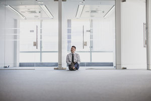 Businessman planning in new office space