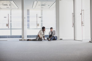 Colleagues planning in new office space