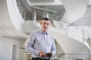 Portrait of businessman in modern office space