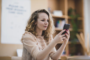 Student using smartphone in class