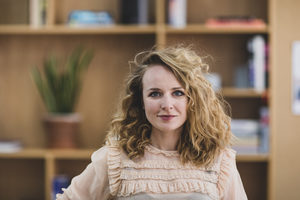 Portrait of young adult female looking to camera