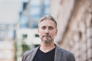 Portrait of mature male outdoors in city