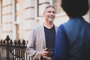 Male friends outdoors in city