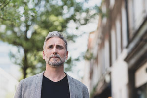 Mature male outdoors in city