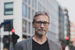 Portrait mature male outdoors in city