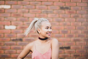 Young adult female looking away from camera