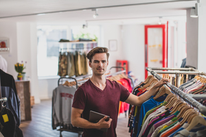 Portrait of a store manager in clothing store