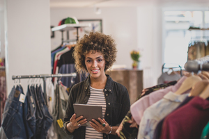 Portrait of a store manager in clothing store