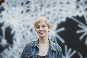 Portrait of Millennial with street art