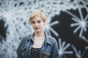 Portrait of Millennial with street art