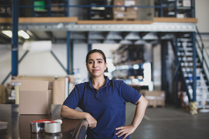 Portrait of female working in packing warehouse