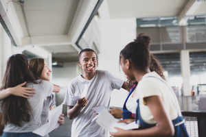 High school students opening their exam results