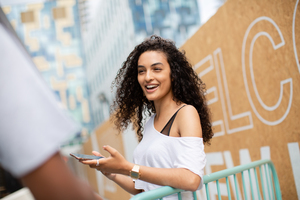 Teenagers socialising outdoors in city