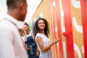 Group of teenagers working together on a community project