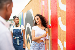 Group of teenagers working together on a community project