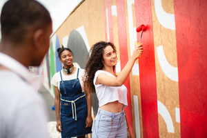 Group of teenagers working together on a community project