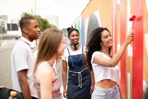 Group of teenagers working together on a community project