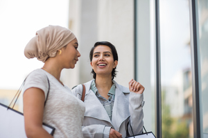 Muslim friends window shopping