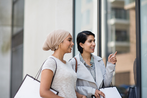 Muslim friends window shopping