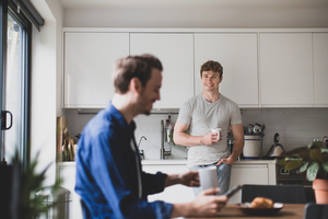 Roommates having breakfast together