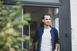 Adult male leaving the house