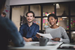 Coworkers in a late meeting