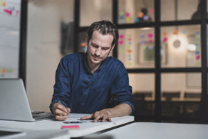 Adult male working late in an office