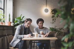 Coworkers having a meeting in a cafe