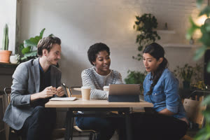 Coworkers having a meeting in a cafe