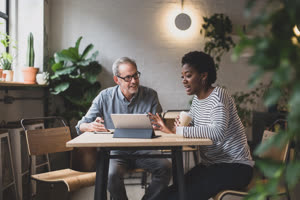 Coworkers having a meeting in a cafe