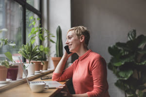 Freelance businesswoman working in a cafe