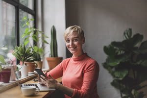 Portrait of a freelance businesswoman working in a cafe