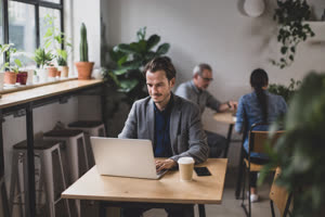 Freelance businessman working in a cafe